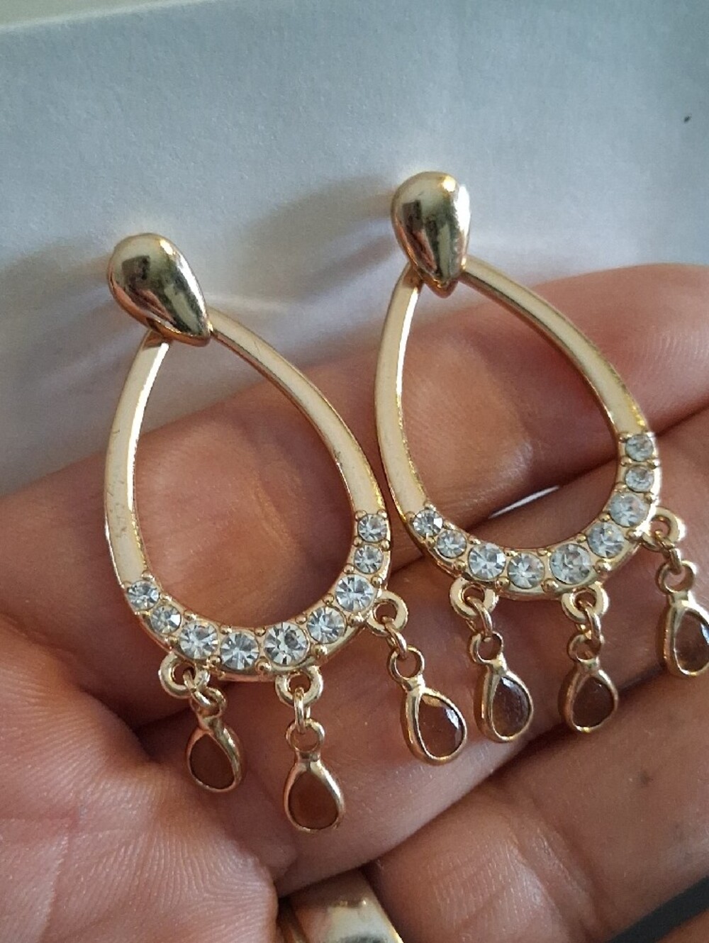 Monet Gold Teardrop Dangle Earrings with Clear Crystals - Picture 2 of 6